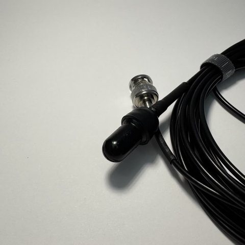 AquaHear 2.5 hydrophone, a slim black cylinder on a coiled cable.